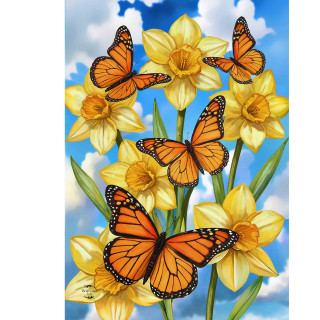 Monarch butterflies on yellow daffodils against a blue sky with white clouds garden flag design.