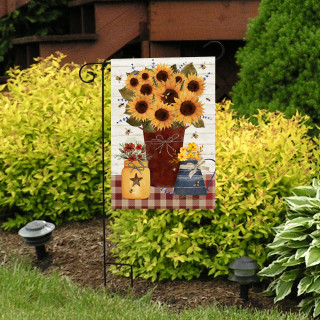 Farmers Market Garden Flag with sunflowers, vase, jug, and stars on red plaid background outdoors.