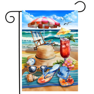 Beach Day Garden Flag with beach scene, umbrella, chair, hat, sunglasses, and tropical drink on towel.