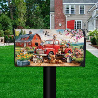 Farm Pups Mailbox Cover with colorful dogs, red truck, and flowers on a lawn post outdoors.