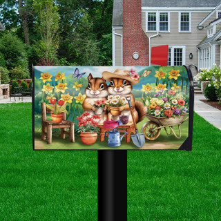 Springtime Chipmunks Mailbox Cover with colorful flowers and chipmunks on a lawn in front of house.