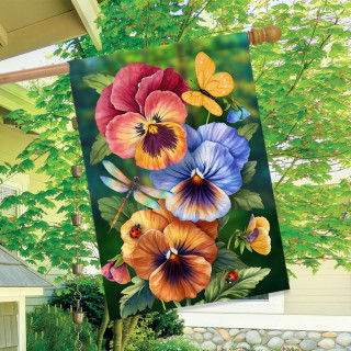 Pansy Trio House Flag with colorful pansies, butterflies, and insects on a garden background outdoors.