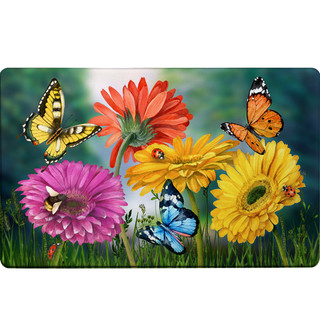 Butteflies and Daisies Comfort Mat with colorful flowers and butterflies on a green background.