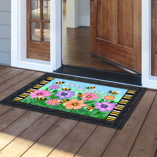 Busy Bees Doormat with colorful bee and flower design on a black background with yellow accents.