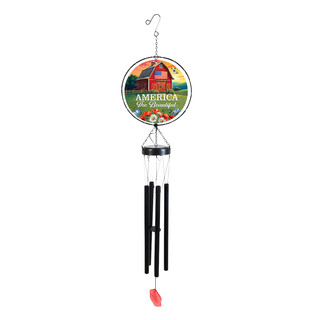 American Barn Illuminated Wind Chime with red barn and green landscape design hanging from hook.