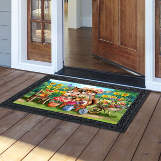 Springtime Chipmunks doormat with colorful floral design and chipmunks on green background and black border.