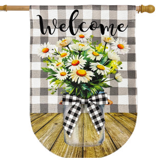 Welcome Farmhouse Jar Burlap House Flag with daisies and checkered ribbon on wooden table background.