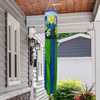 Bluebirds and Daffodils Windsock Wind Twister with blue, green, yellow, and white floral design hanging outdoors.