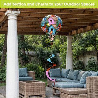Spring Celebration Birdhouses Hot Air Balloon Spinner hanging from a pergola amidst outdoor furniture and greenery.