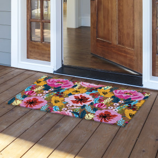 Vibrant Blooms natural fiber coir doormat, 18 x 30, colorful floral design on wooden porch.