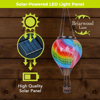 Colorful Patchwork Solar Balloon Lantern with vibrant tie-dye design, solar panel, by Briarwood Lane outdoors.