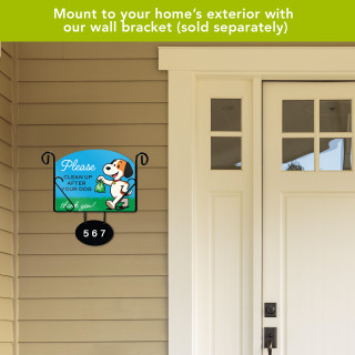 Acrylic art sign with dog graphic and "Please Clean After Dog" text on house exterior.