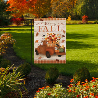 Fall Bounty Truck Garden Flag with orange truck, leaves, and "happy FALL" on a garden lawn.