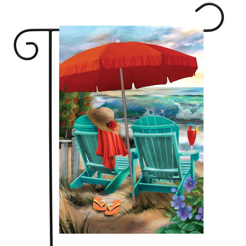 Briarwood Lane Beach Life Garden Flag with colorful beach scene and red umbrella on sand.