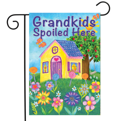 Briarwood Lane spring garden flag reads "Grandkids Spoiled Here" amidst colorful flowers and sweet treats.
