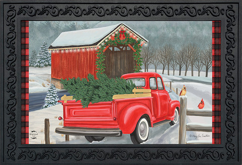 Briarwood Lane Festive Covered Bridge Christmas Doormat with red truck and snowy country scene design.
