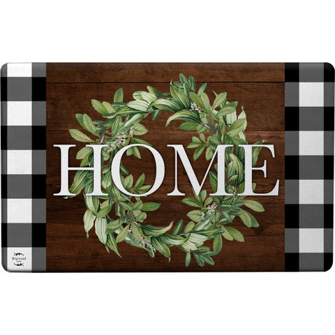 Briarwood Lane Farmhouse Wreath Comfort Mat with green leaves and HOME text on wood background.
