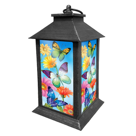 Briarwood Lane Fluttering Butterflies Lantern with colorful butterflies and flowers on a black metal frame.