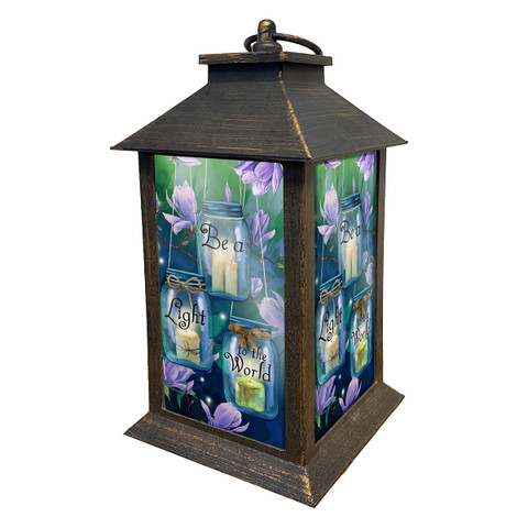 Briarwood Lane Be a Light To the World lantern with purple flowers and candle design.