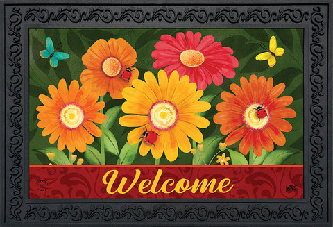 Briarwood Lane colorful daisies doormat with welcome sign and vibrant flowers in orange, yellow, red hues.