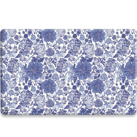 Blue and white floral comfort mat with large and small flowers on a white background.