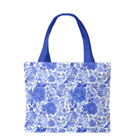 Blue and white floral canvas tote bag with blue handles on a plain white background shown.