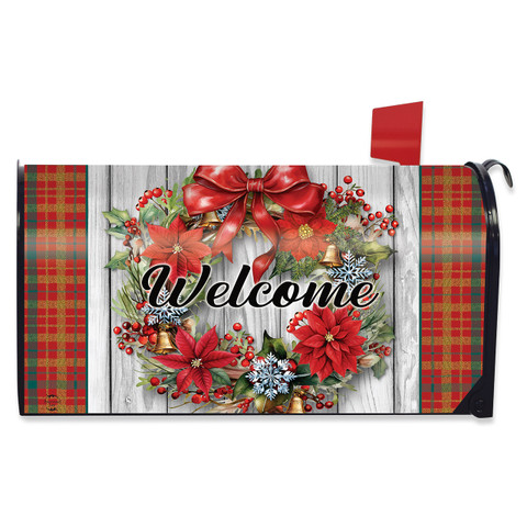 Holiday Poinsettia Wreath Mailbox Cover with red flowers, green leaves, and Welcome text on wood.
