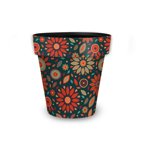 Small planter with orange and teal floral design on a dark green background.