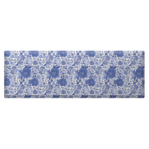 Blue and white oversized floral comfort mat with floral pattern on a plain white background.