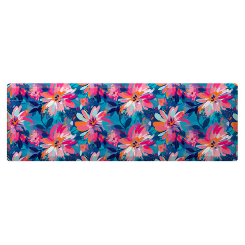 Vibrant floral comfort mat with pink, orange, and white flowers on a blue background, oversized design.