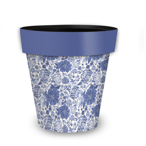 Blue and white floral planter with blue rim and floral design on white background.
