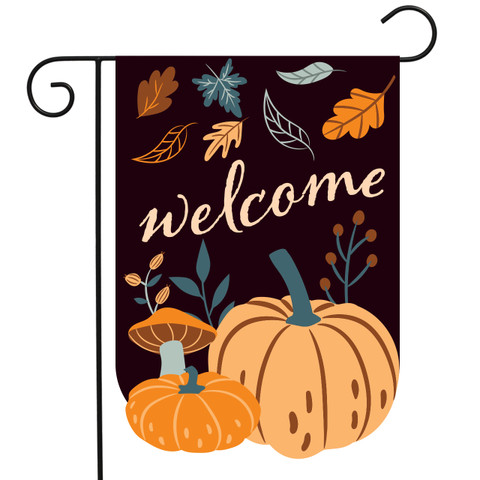 Burlap garden flag with pumpkins, mushrooms, and leaves on dark background with welcome text.