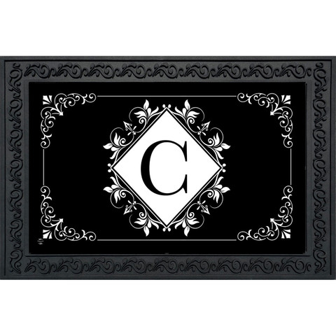 Black and White Monogram C doormat with floral design on black background.