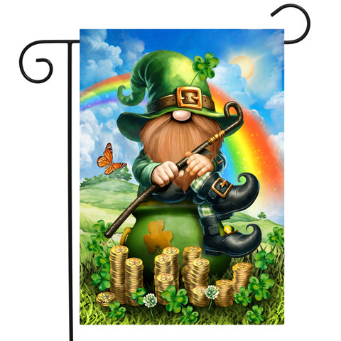 Lucky Irish Gnome Garden Flag with green hat, rainbow, and gold coins outdoors decoration accessory.