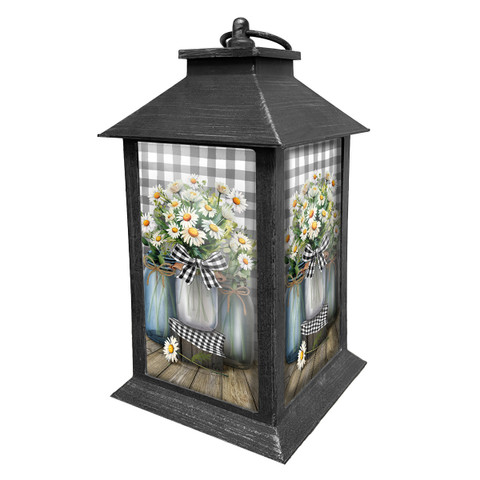 Black metal Farmhouse Jars Lantern with floral design and gingham background and handle on top.