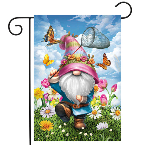 Springtime Gnome Garden Flag with colorful garden gnome and butterflies among flowers outdoors.