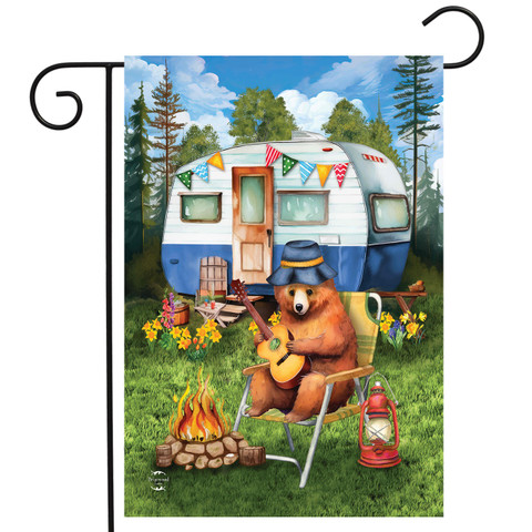 Camping Bear Garden Flag, brown bear sitting by campfire with guitar and lantern nearby outdoors.