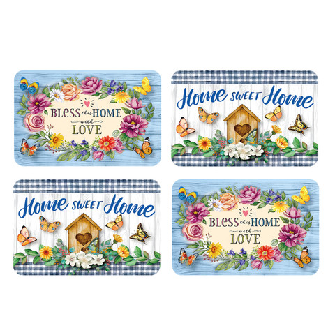 Four colorful placemats with floral designs, birdhouses, butterflies, and "Bless This Home With Love" text.