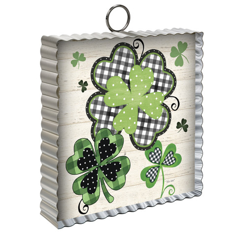 Patterned Shamrocks Metal Mini Moment, green shamrocks with black and white details on white background.