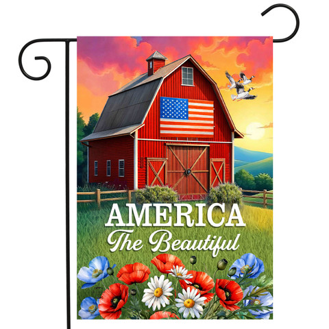 American Barn Garden Flag with red barn, American flag, flowers, and "America The Beautiful" text.