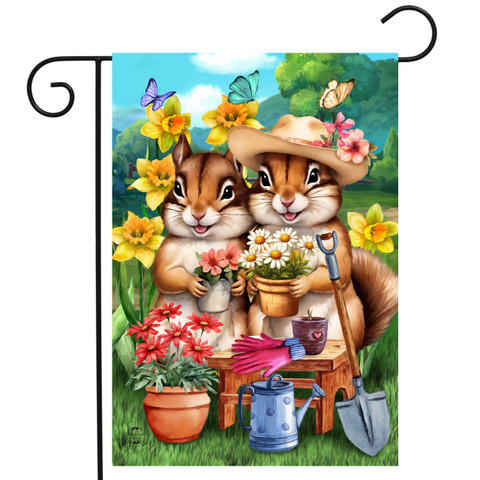 Springtime Chipmunks Garden Flag with colorful flowers, gardening tools, and two chipmunks in a garden scene.