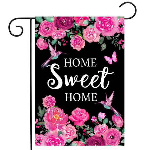Home Sweet Home Hummingbirds Garden Flag with pink flowers, hummingbirds, and butterflies on black background.