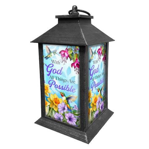 Black lantern with colorful floral design, hummingbirds, and "All Things Are Possible" inspirational text.