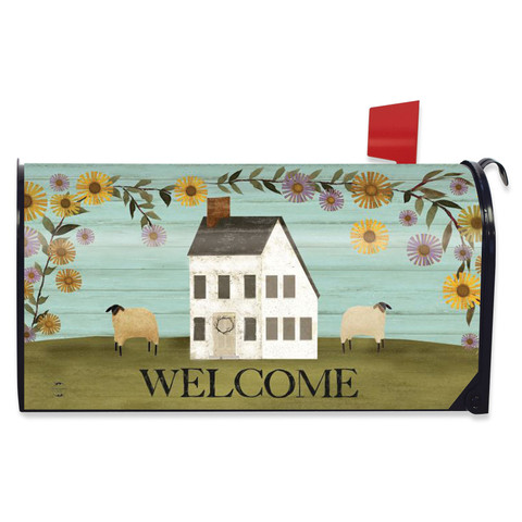 Country Saltbox Mailbox Cover with white house, sheep, flowers, and welcome text on green grass.