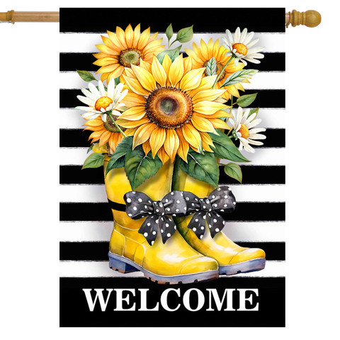 Yellow rain boots with black bow and sunflowers on black and white striped welcome house flag.