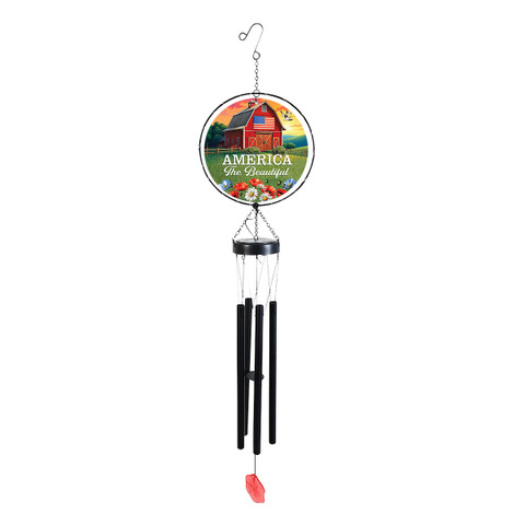 American Barn Illuminated Wind Chime with red barn and green landscape design hanging from hook.