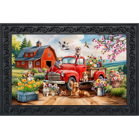 Farm Pups Doormat with red truck, dogs, flowers, and barn in a black frame design.