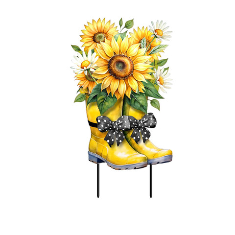Yellow rain boots with black bows and sunflowers on a metal stand for garden decoration.