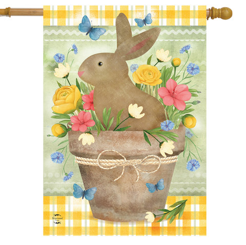 Brown bunny in a flowerpot with colorful flowers and butterflies on a yellow house flag.
