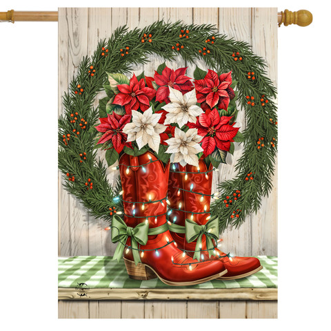Red cowboy boots with green bows and lights, filled with red white poinsettias in a wreath.